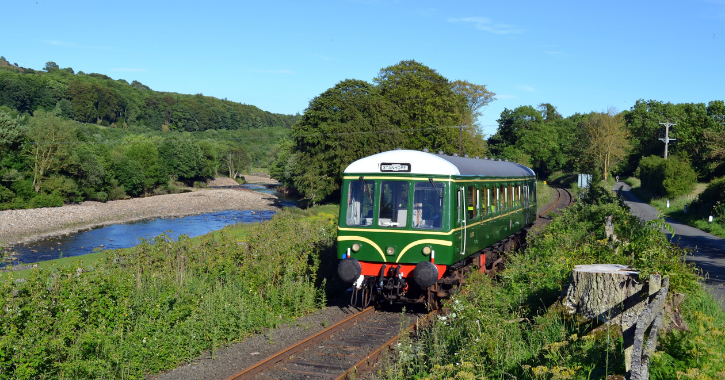 Vintage train on the Weardale Railway line on a bright sunny day